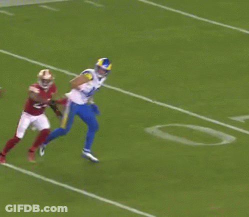 Football Player Being Tackled GIF