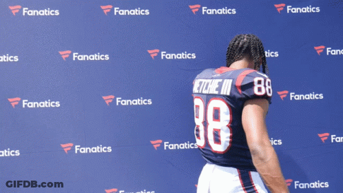 Football Player By Blue Fanatics Wall GIF
