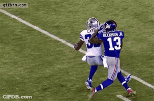 Football Player Catching Ball Blocked GIF