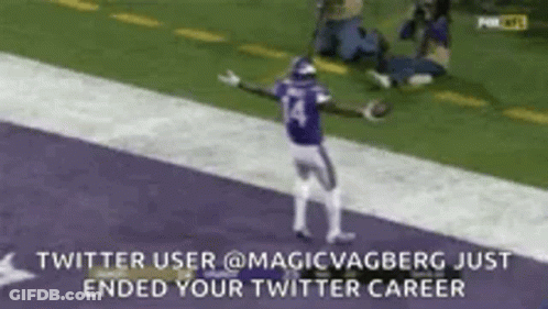 Football Player Celebrating Touchdown With Arms Outstretched GIF
