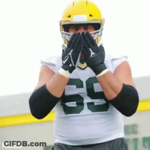 Football Player Covering Mouth GIF