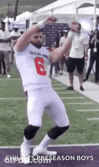 Football Player Dancing With Hands Up GIF