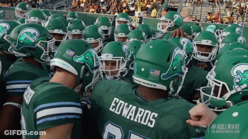 Football Player Edwards Surrounded By Players GIF