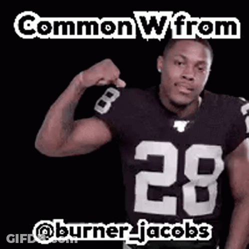 Football Player Flexing In Black And White Jersey GIF