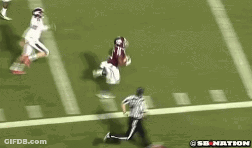 Football Player Handstand Referee Watches GIF