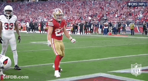 Football Player Helmet Adjusted By Person GIF