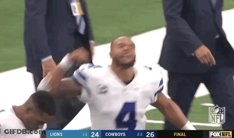 Football Player Helped Off Field By Coach GIF