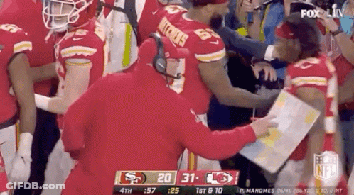 Football Player Helped Off Field By Coach GIF
