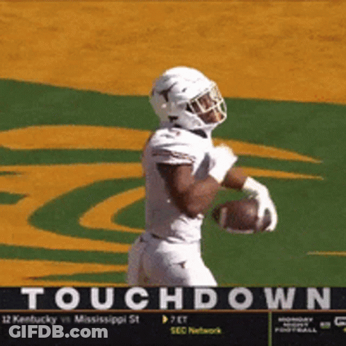 Football Player Holding Football GIF