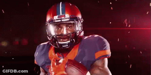 Football Player Holding Football GIF