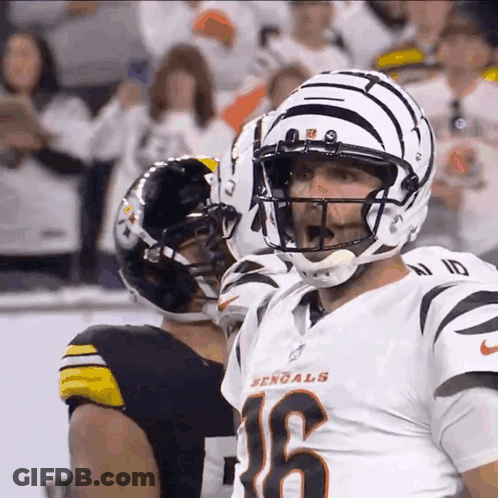 Football Player Holding Helmet Saying There He Is GIF
