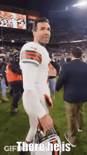 Football Player Holding Helmet Saying There He Is GIF