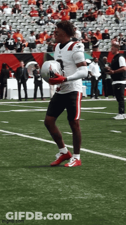 Football Player Holding Helmet With Imgflip Watermark GIF