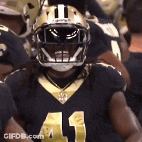 Football Player In Black And Gold Uniform Number 41 GIF