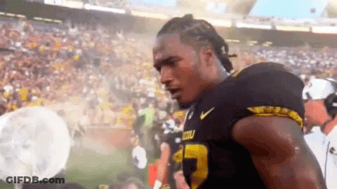 Football Player In Black And Yellow Jersey Number 23 GIF