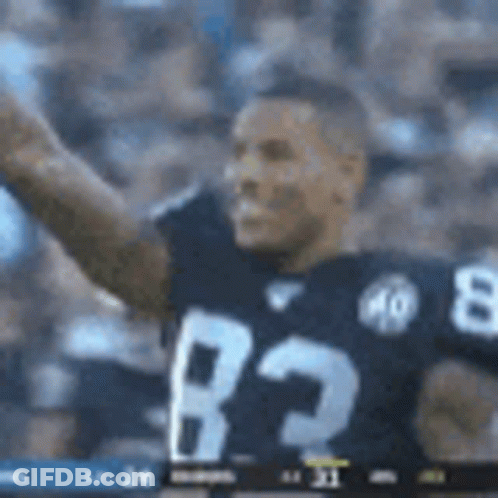 Football Player In Black Jersey 83 Waving Hand GIF