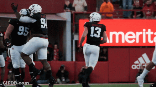 Football Player In Black Jersey Number 13 GIF