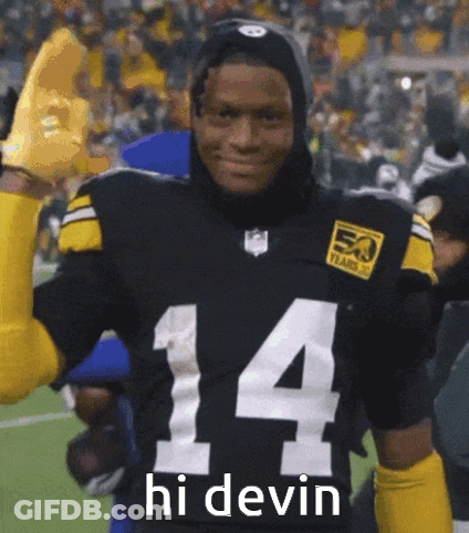 Football Player In Black Jersey Number 14 Giving High Five GIF