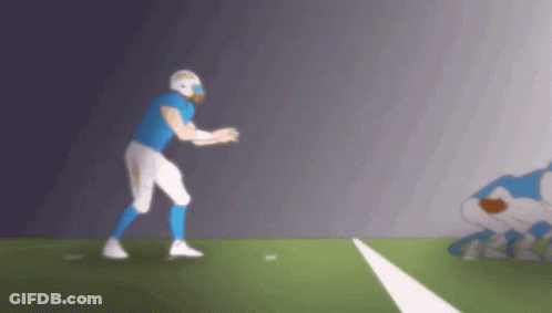 Football Player In Blue And White Uniform About To Throw Ball GIF