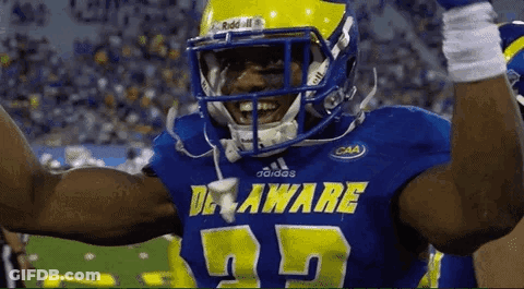 Football Player In Blue And Yellow Jersey Number 35 GIF