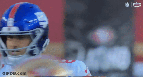 Football Player In Blue Giants Helmet GIF