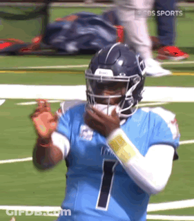 Football Player In Blue Jersey And Helmet GIF