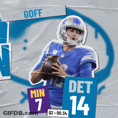 Football Player In Blue Jersey Holding Ball GIF
