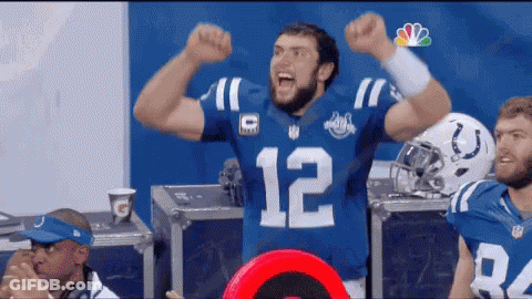 Football Player In Blue Jersey Number 12 GIF