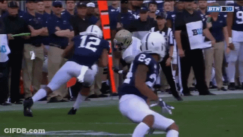 Football Player In Blue Jersey Number 12 GIF