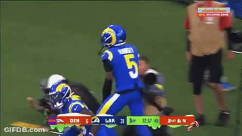 Football Player In Blue Jersey Number 15 GIF