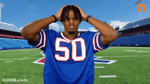 Football Player In Blue Jersey Number 50 GIF