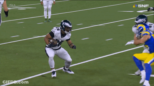Football Player In Blue Jersey Number 50 GIF