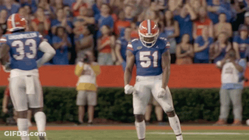 Football Player In Blue Jersey Number 51 GIF