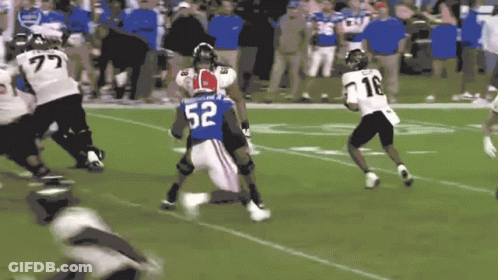 Football Player In Blue Jersey Number 52 GIF