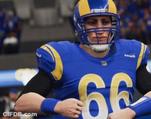 Football Player In Blue Jersey Number 66 GIF