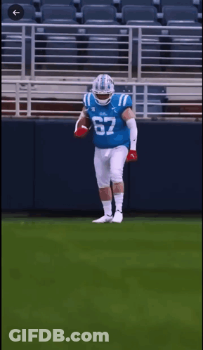 Football Player In Blue Jersey Number 67 GIF