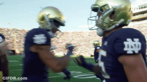 Football Player In Blue Jersey With Letter N GIF