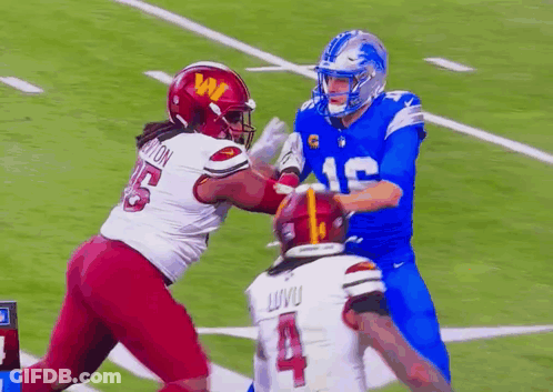 Football Player In Blue Uniform Number 12 GIF