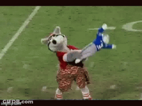 Football Player In Blue Uniform Number 12 Laying Down GIF