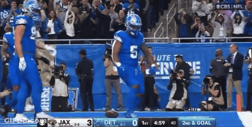 Football Player In Blue Uniform Number 5 GIF