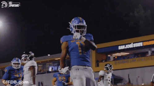 Football Player In Blue Uniform Number 7 GIF