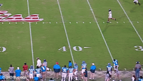 Football Player In Blue Uniform Running GIF