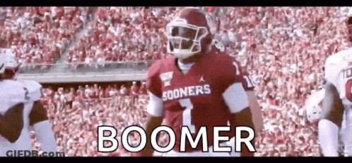 Football Player In Boomer Jersey In Front Of Crowd GIF