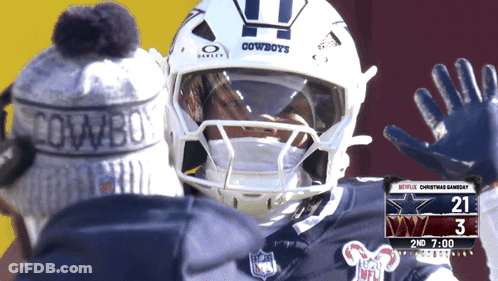 Football Player In Cowboys Helmet With Man In Cowboys Hat GIF