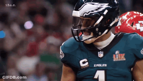 Football Player In Eagles Jersey And Helmet GIF
