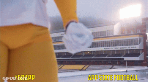Football Player In Front Of App State Football Stadium GIF