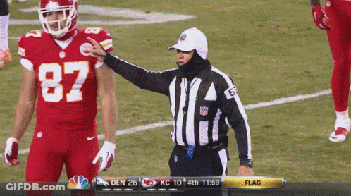 Football Player In Front Of Chiefs Kingdom Sign GIF