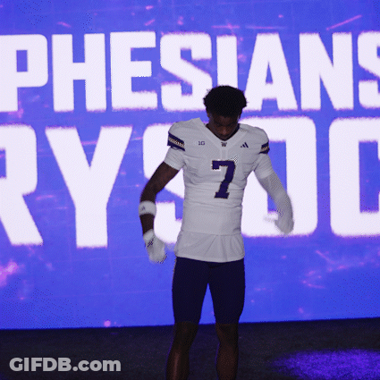 Football Player In Front Of Pheisians Screen GIF