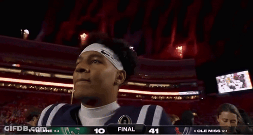 Football Player In Front Of Scoreboard Saying Final GIF