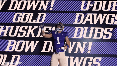 Football Player In Front Of U-Duf Sign GIF
